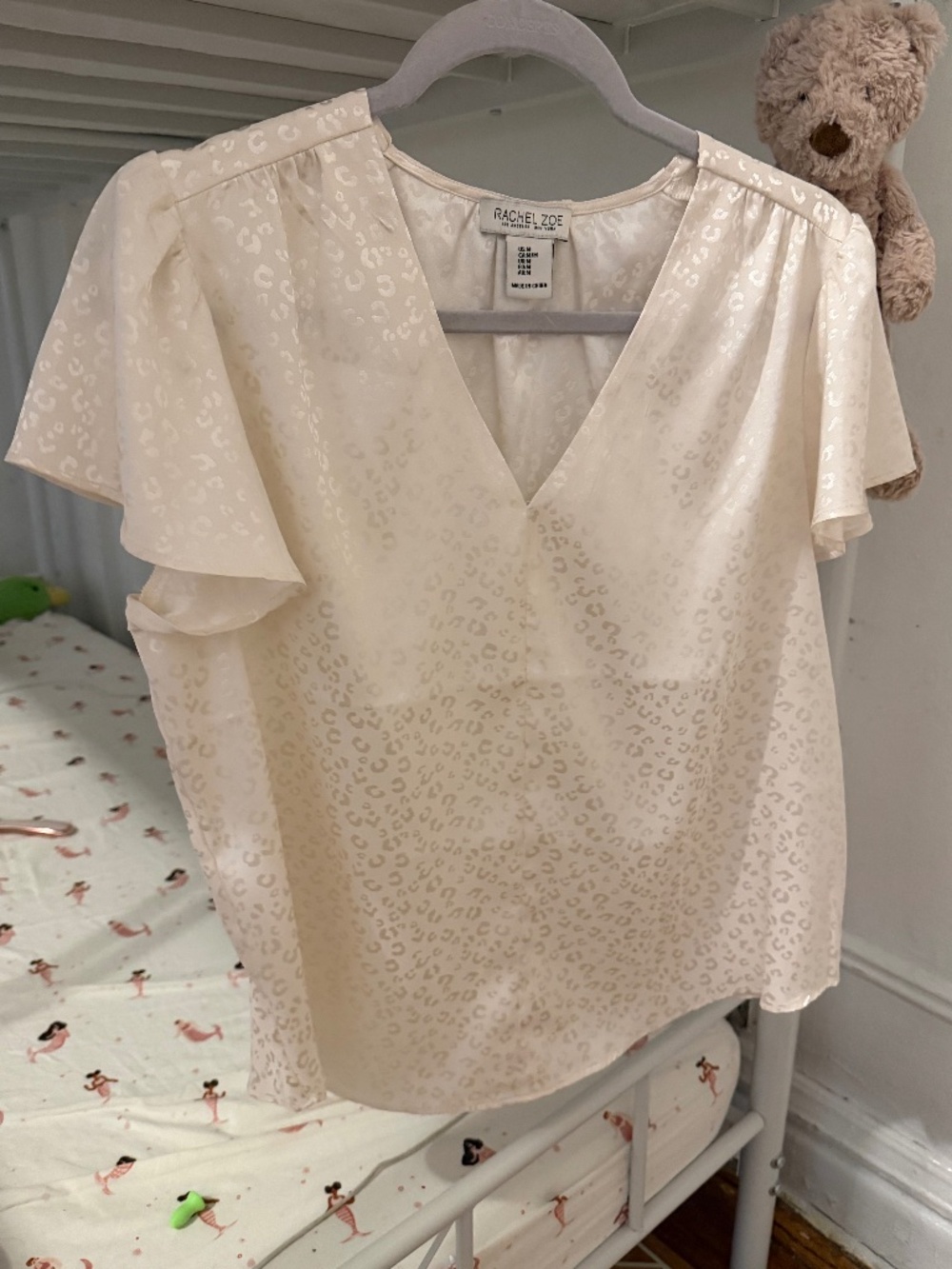 white cheetah print blouse